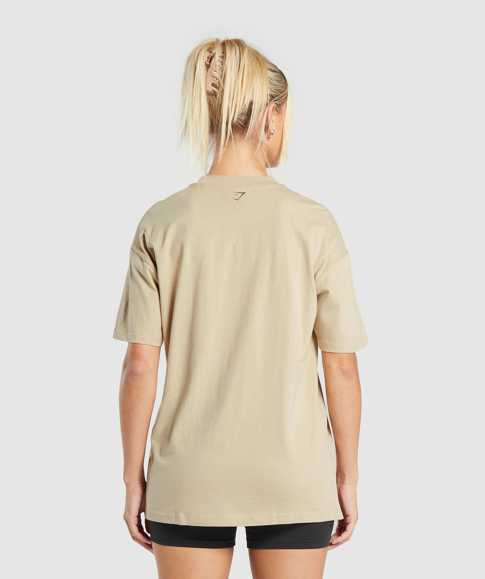 CARE LABEL GRAPHIC OVERSIZED T-SHIRT