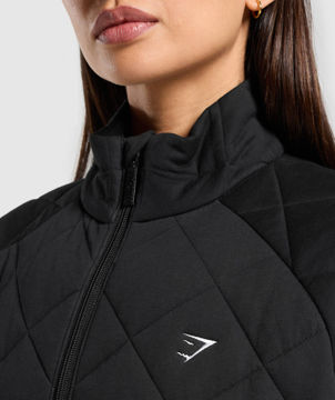 QUILTED ZIP THROUGH